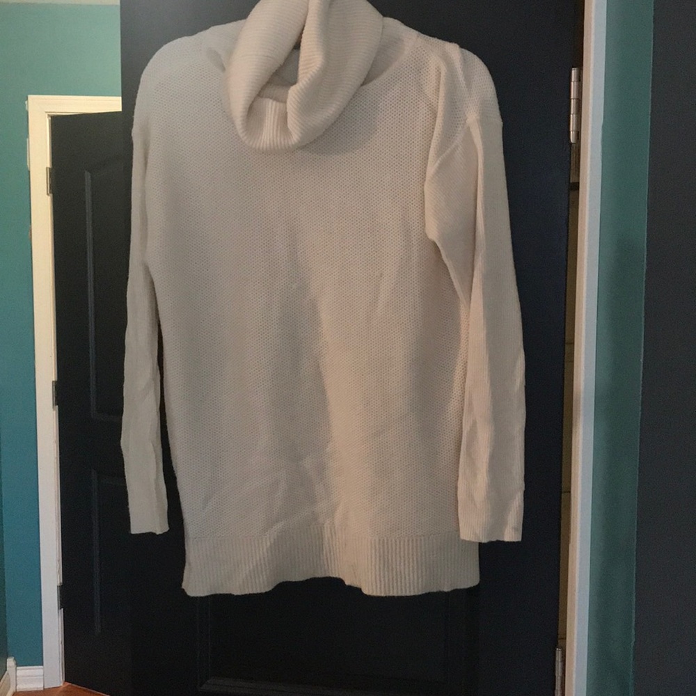 Cream colored turtleneck sweater